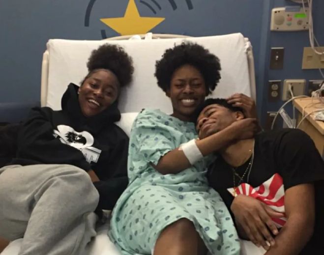 Patients resting together in hospital bed